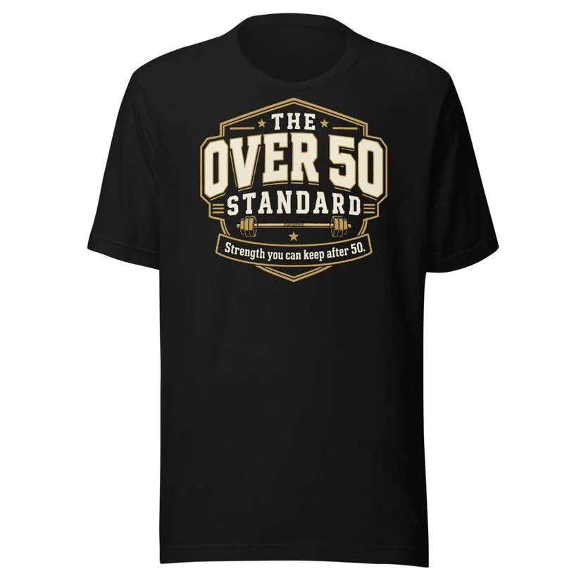 The Over 50 Standard Badge Tee on a black t-shirt